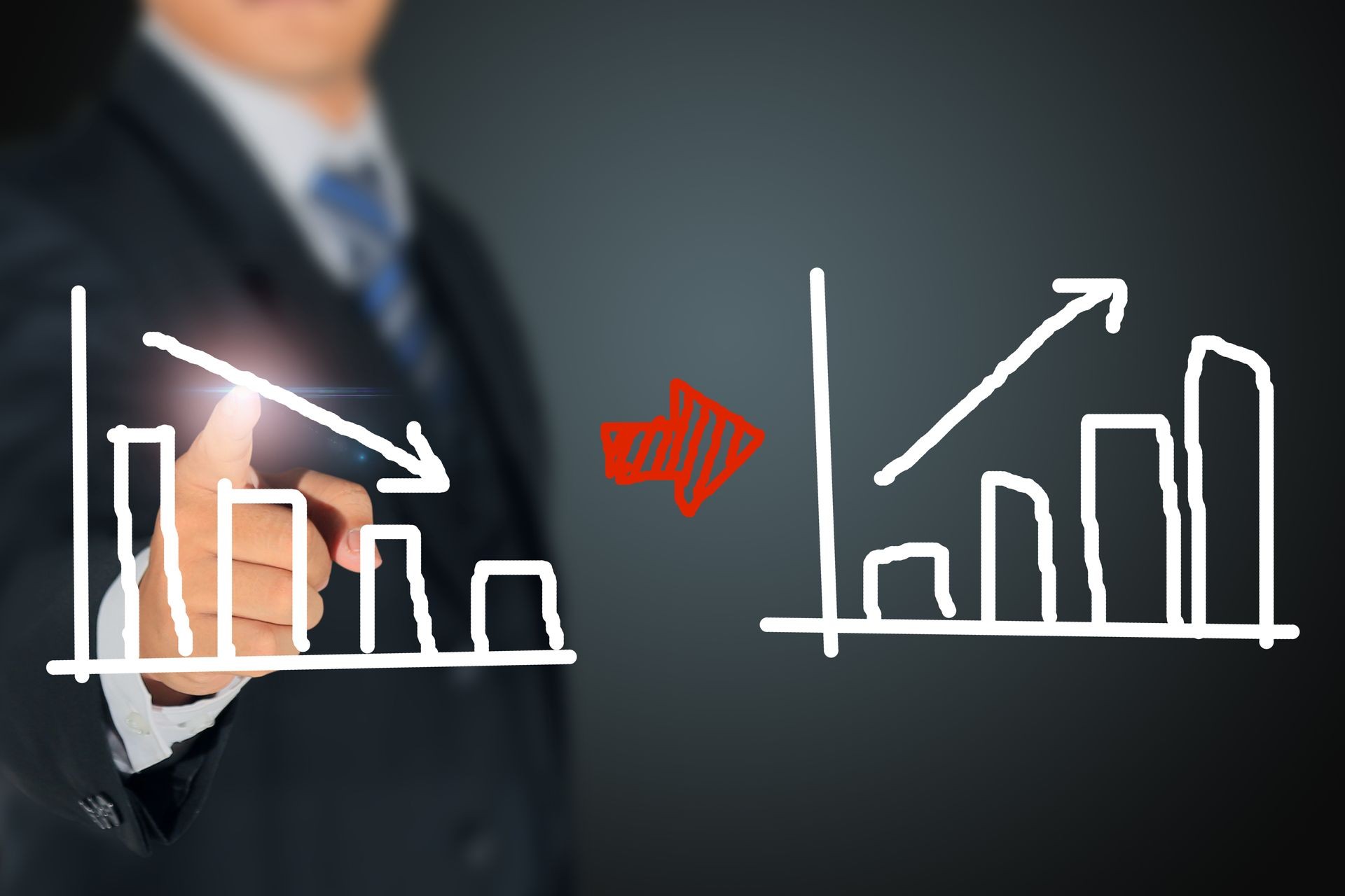 businessman showing process from deficit to profit