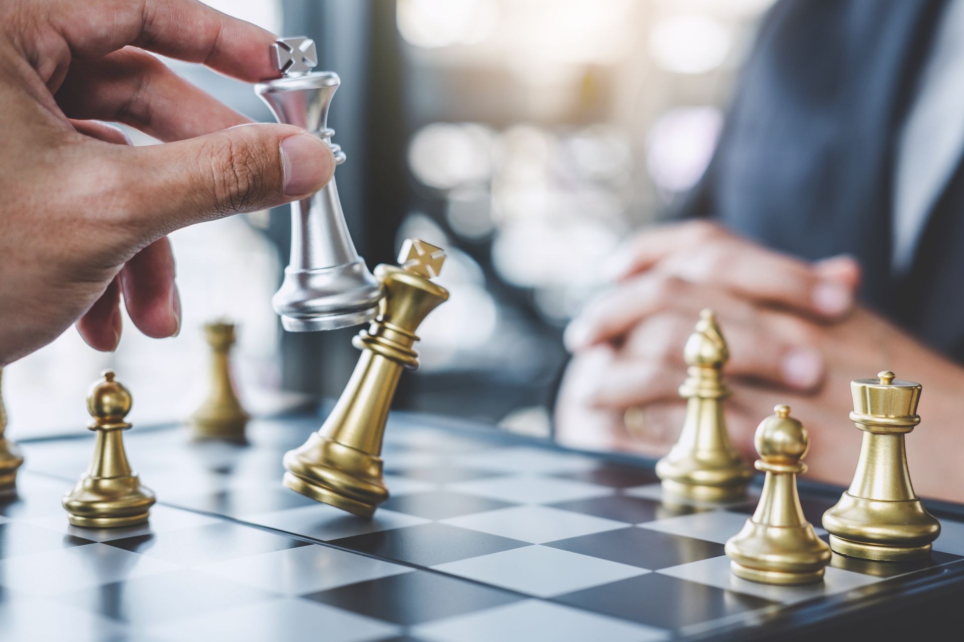 Two businessman playing chess game to plan strategy for success, thinking for planning overcoming difficulty and achieving goals business strategy for win.